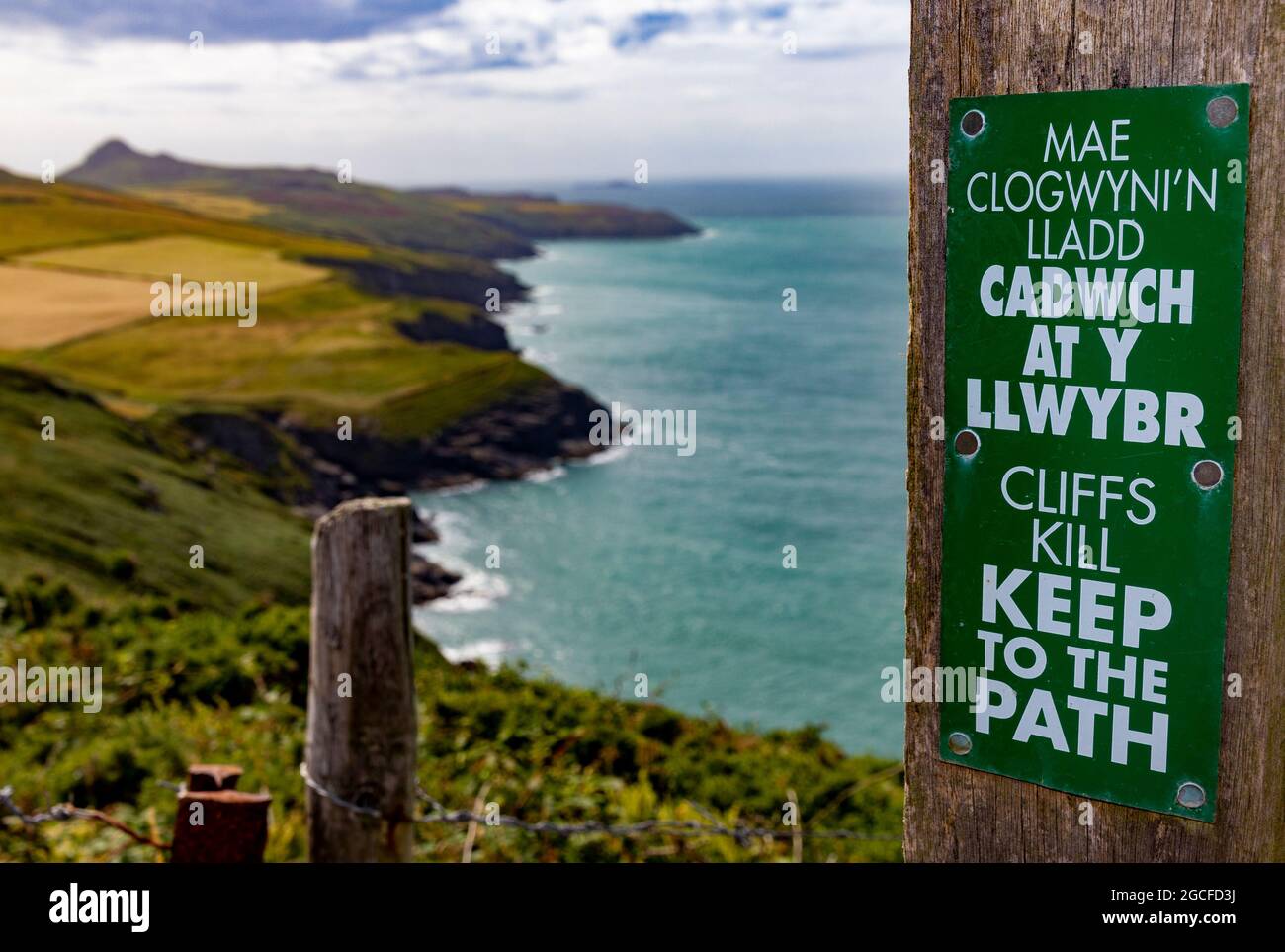 dangerous cliffs sign Pembrokeshire Coast Path Stock Photo