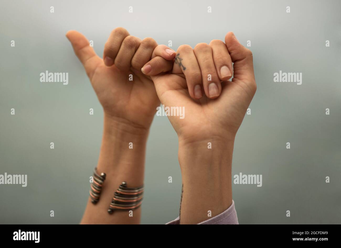 gesture of friendship with hands Stock Photo