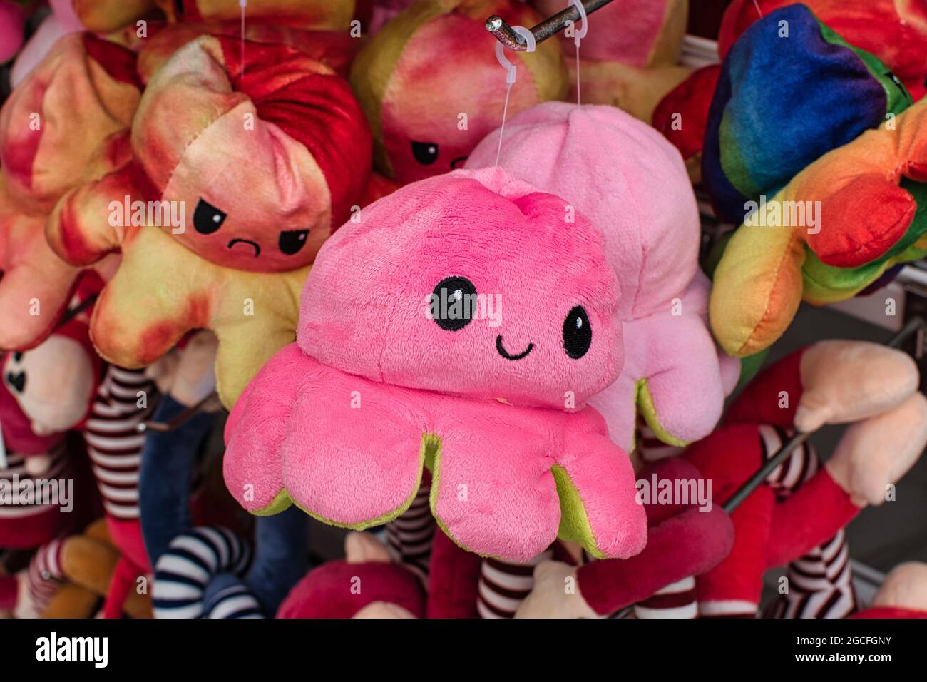 Reversible emotion octopus plush Stock Photo - Alamy