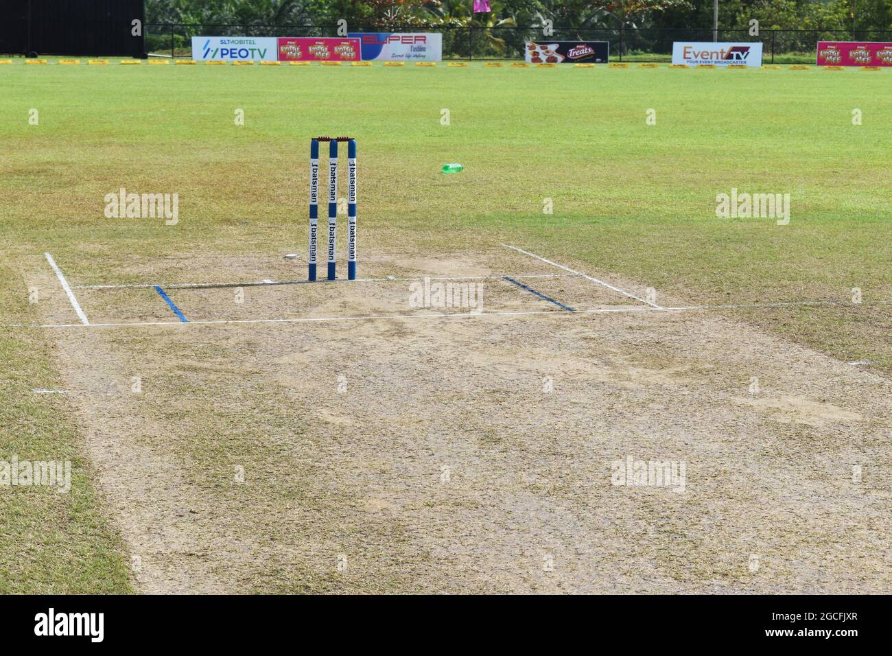 The pitch at the picturesque Army Ordinance cricket grounds. Dombagoda. Sri Lanka. Stock Photo