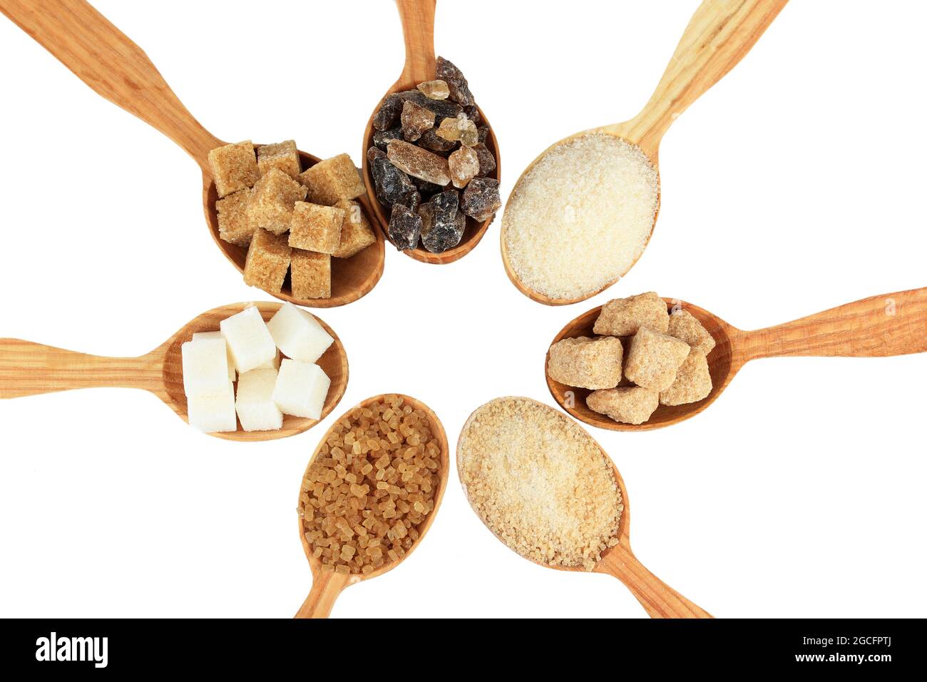 Different types of sugar in spoons isolated on white Stock Photo Alamy