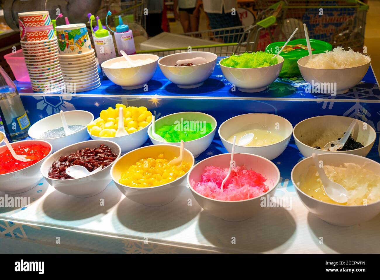Street counter selling ice cream with different flavors. Stock Photo