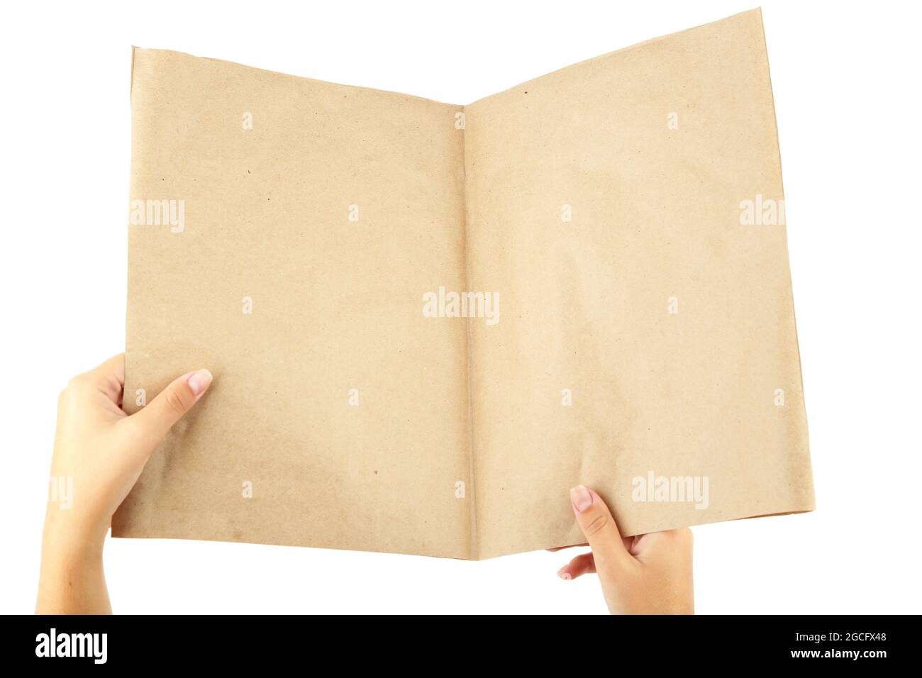 Newspaper in hands isolated on white Stock Photo Alamy