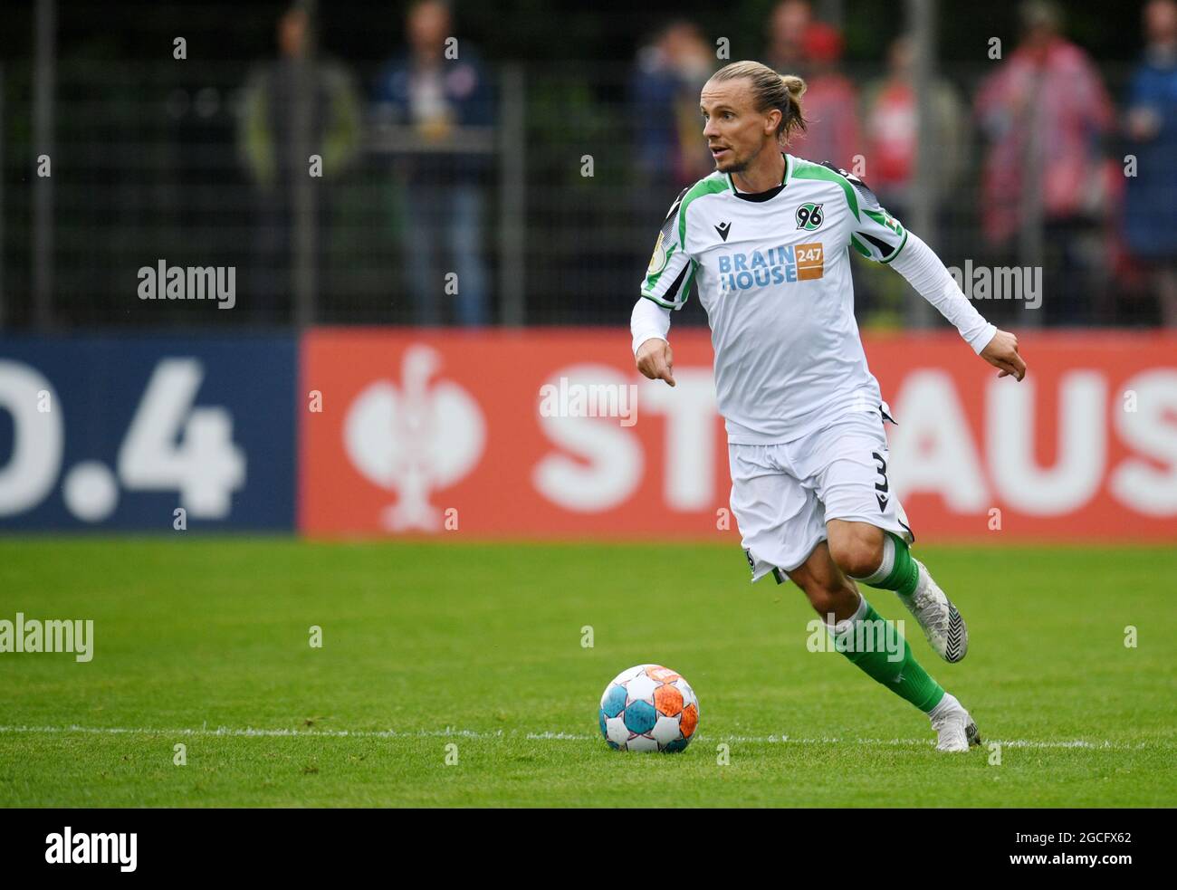 Norderstedt, Germany. 07th Aug, 2021. Football: DFB Cup, Eintracht Norderstedt - Hannover 96, 1st round at Edmund-Plambeck-Stadion. Hannover's Niklas Hult plays the ball. Credit: Daniel Reinhardt/dpa - IMPORTANT NOTE: In accordance with the regulations of the DFL Deutsche Fußball Liga and/or the DFB Deutscher Fußball-Bund, it is prohibited to use or have used photographs taken in the stadium and/or of the match in the form of sequence pictures and/or video-like photo series./dpa/Alamy Live News Stock Photo