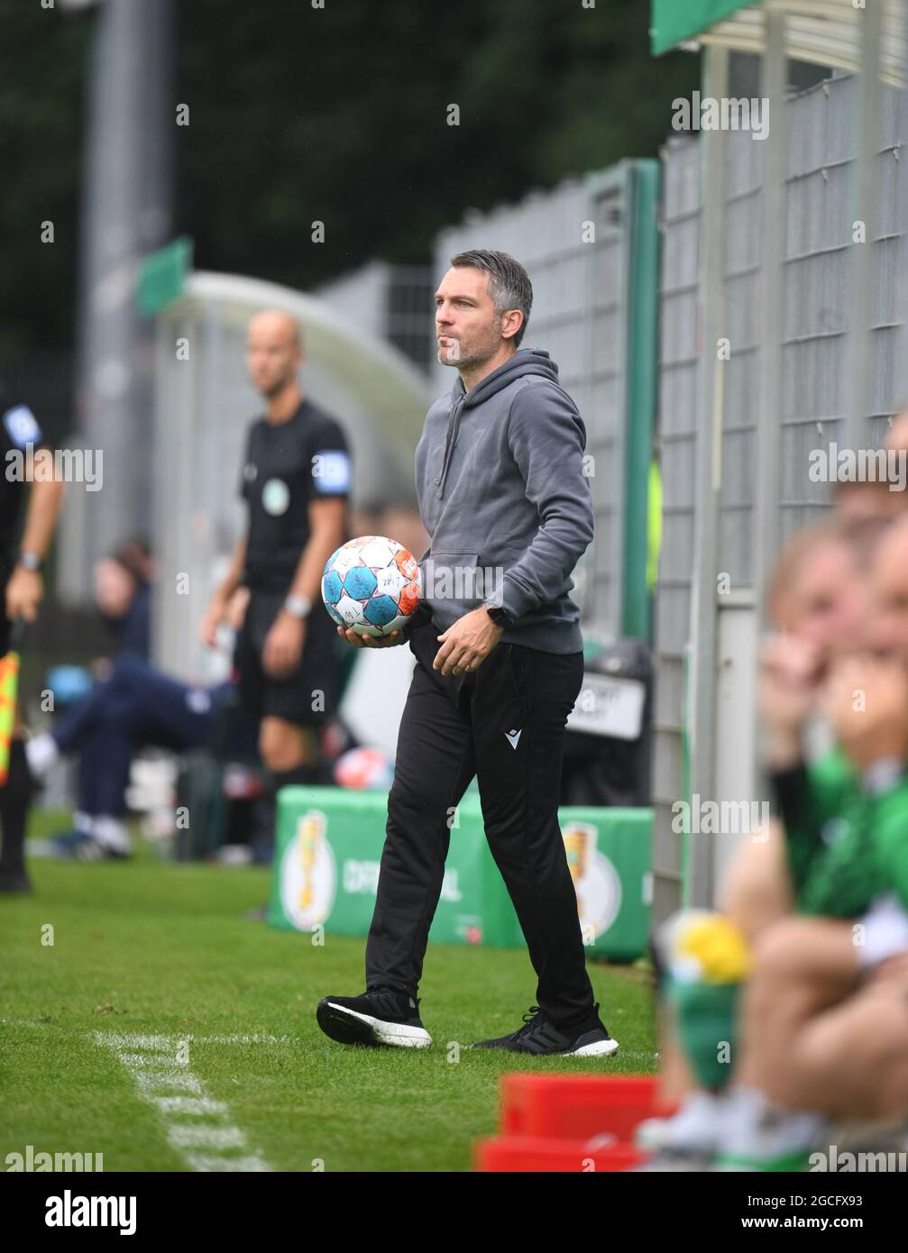 Norderstedt, Germany. 07th Aug, 2021. Football: DFB Cup, Eintracht Norderstedt - Hannover 96, 1st round at Edmund-Plambeck-Stadion. Hannover's coach Jan Zimmermann is on the sidelines. Credit: Daniel Reinhardt/dpa - IMPORTANT NOTE: In accordance with the regulations of the DFL Deutsche Fußball Liga and/or the DFB Deutscher Fußball-Bund, it is prohibited to use or have used photographs taken in the stadium and/or of the match in the form of sequence pictures and/or video-like photo series./dpa/Alamy Live News Stock Photo