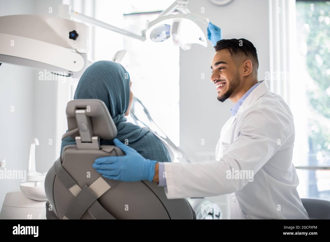 Dental Treatment Arab Dentist Doctor Making Check Up To Muslim Female Patient In Stomatological Clinic Middle Eastern Stomatologist Consulting Islam Stock Photo Alamy