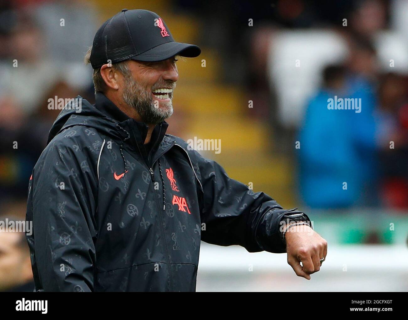Liverpool, England, 8th August 2021.  Jurgen Klopp manager of Liverpool looks at his watch after kick off was delayed for the Pre Season Friendly match at Anfield, Liverpool. Picture credit should read: Darren Staples / Sportimage Stock Photo