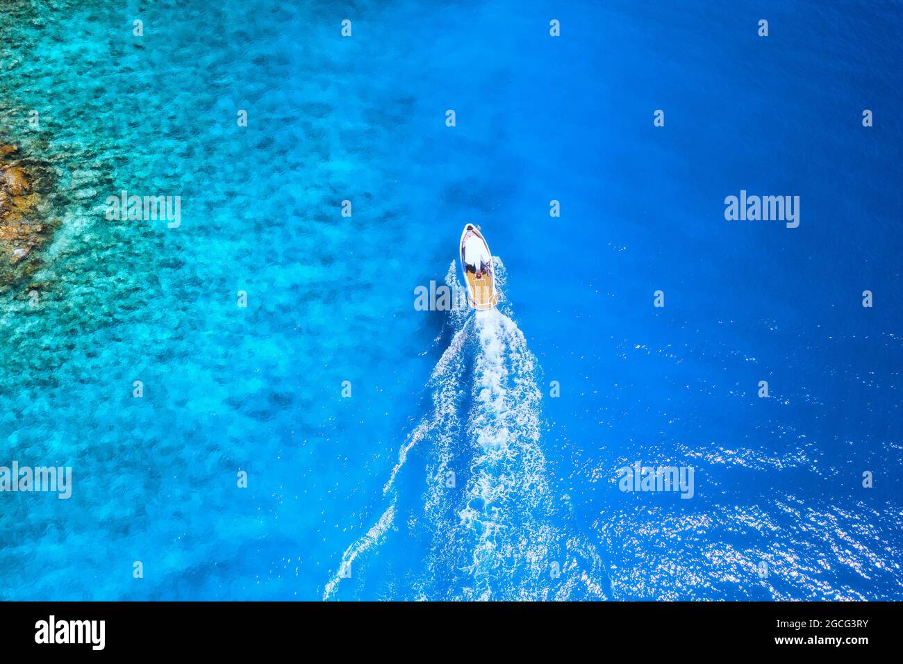 Aerial view of the speed boat in clear blue water at sunny day Stock ...