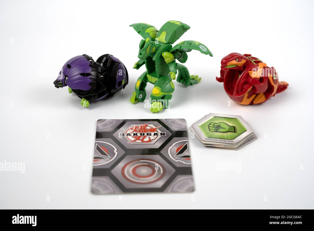 Bakugan Ball toy mini figures with magnetic card and chips. Starter kit. New popular transformer toys. Stafford, United Kingdom, August 8, 2021 Stock Photo