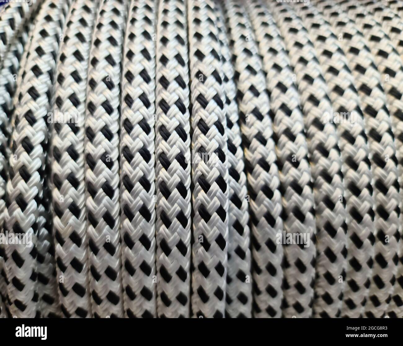Selective focus close up rope background. Low light rope texture. Horizontal gradient pattern Stock Photo
