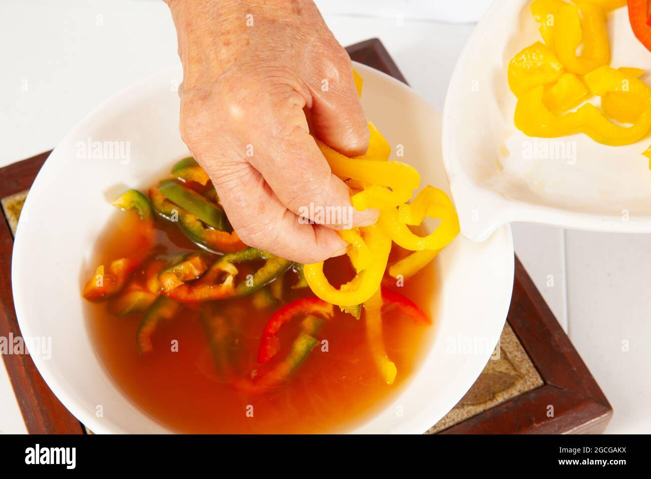 Fish marinade preparation steps Soaking red, green and yellow pepper