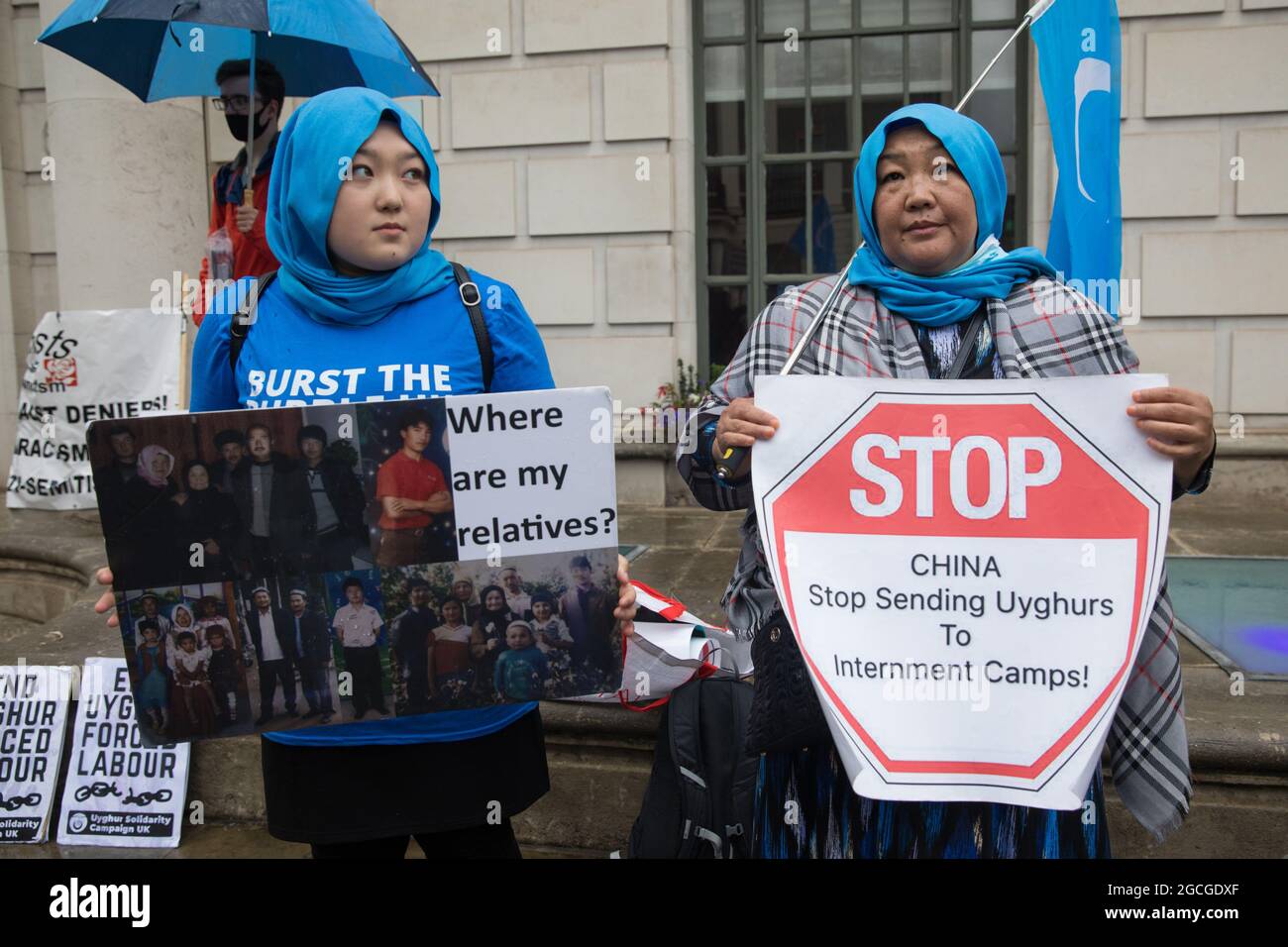 London, UK. 5th August, 2021. Members of the Uyghur community join activists from Uyghur Solidarity Campaign UK and other supporting groups protesting opposite the Chinese embassy in support of the Uyghur people’s struggle for freedom. Activists highlighted the Chinese government's persecution and forced assimilation of Uyghurs, Kazakhs and other indigenous people in East Turkestan and Xinjiang and called for them to have the right to determine their own futures through a democratic process. Credit: Mark Kerrison/Alamy Live News Stock Photo