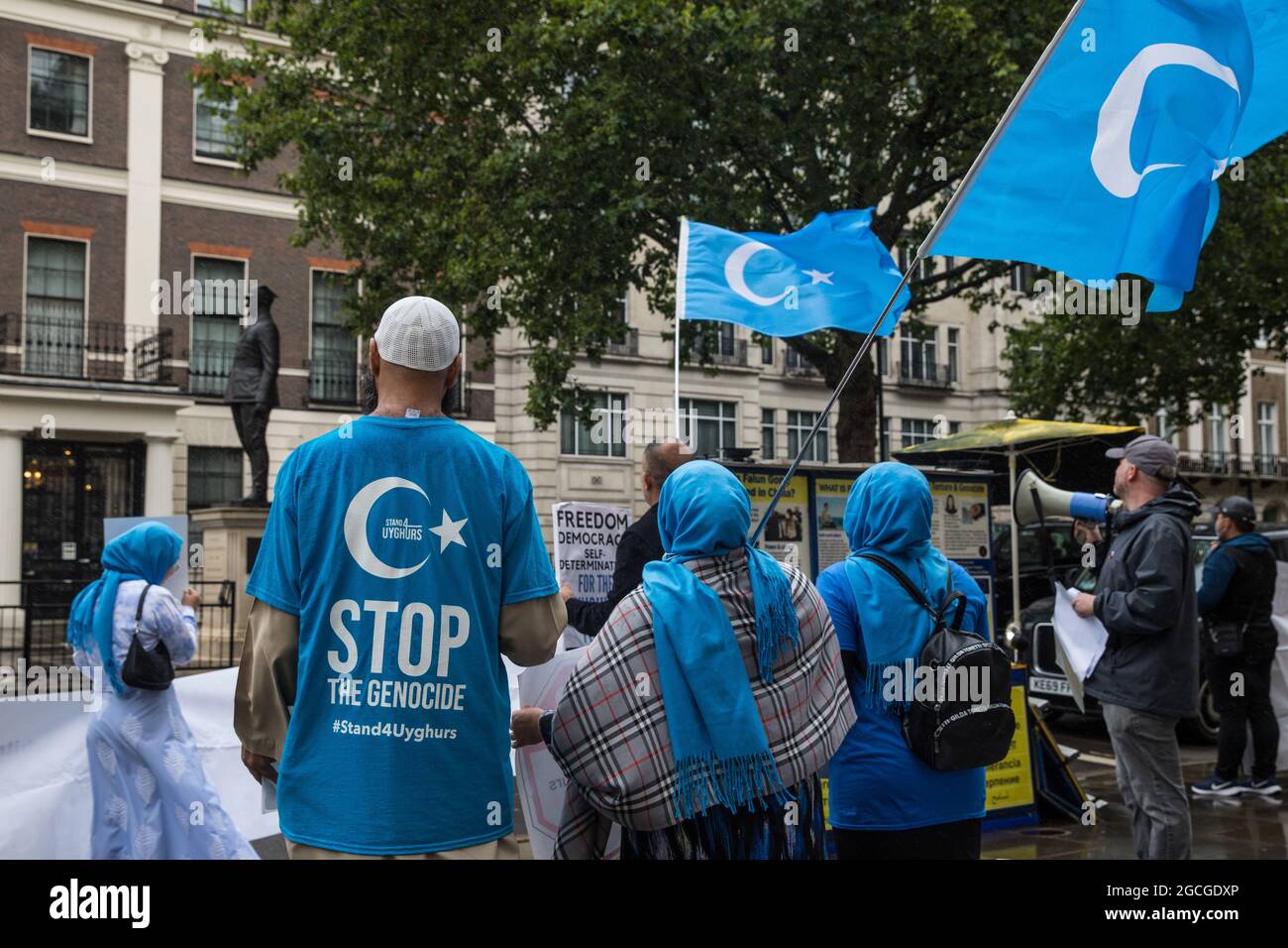London, UK. 5th August, 2021. Members of the Uyghur community join activists from Uyghur Solidarity Campaign UK and other supporting groups protesting opposite the Chinese embassy in support of the Uyghur people’s struggle for freedom. Activists highlighted the Chinese government's persecution and forced assimilation of Uyghurs, Kazakhs and other indigenous people in East Turkestan and Xinjiang and called for them to have the right to determine their own futures through a democratic process. Credit: Mark Kerrison/Alamy Live News Stock Photo
