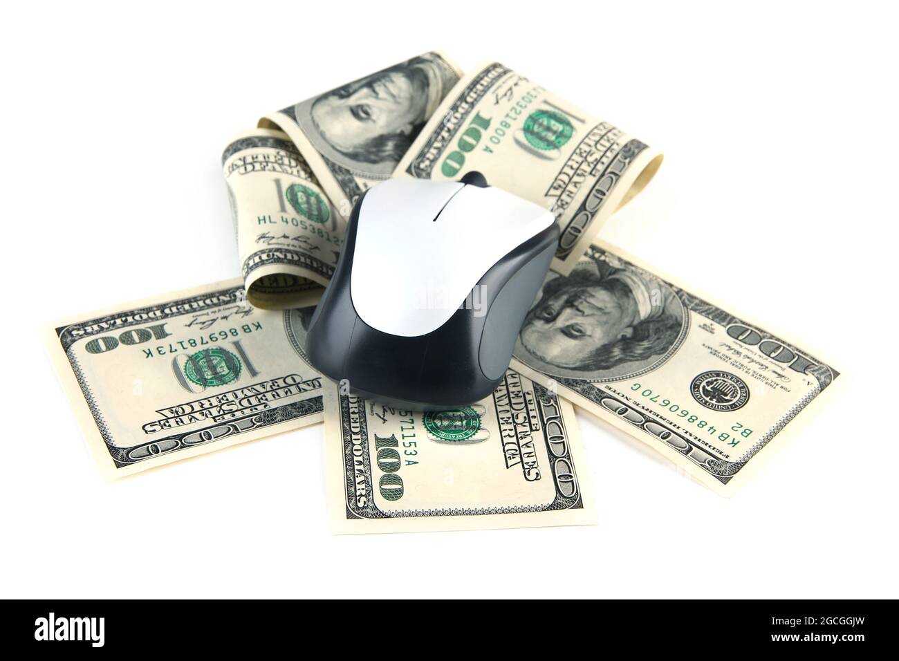 Computer mouse on dollars isolated on white Stock Photo Alamy