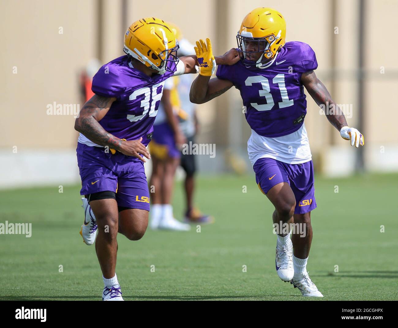 August 8 21 Lsu Defensive Back Cameron Lewis 31 Works A Drill With Teammate Pig Cage 38 During The First Week Of Fall Football Camp At The Lsu Charles Mcclendon Practice Facility August 8 21 Lsu Defensive Back Cameron Lewis 31 Works A Drill With Teammate Pig Cage 38 During The First Week Of Fall Football Camp At The Lsu Charles Mcclendon Practice Facility