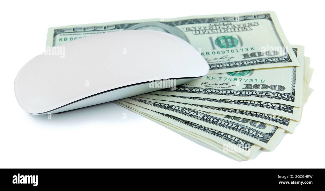 Computer mouse on dollars isolated on white Stock Photo Alamy