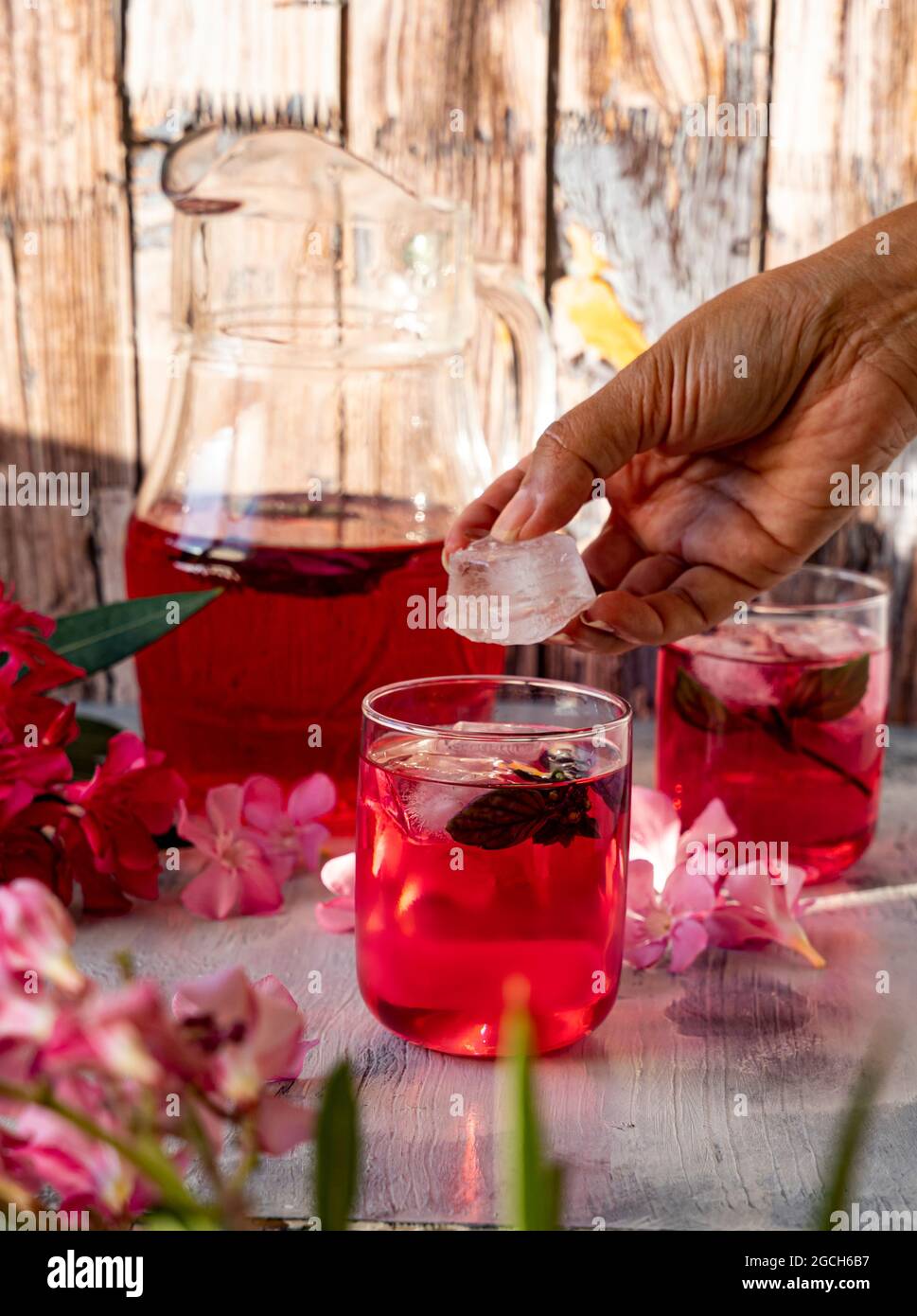 Adding ice to Basil Sherbet, traditional Turkish cold drink, Ottoman
