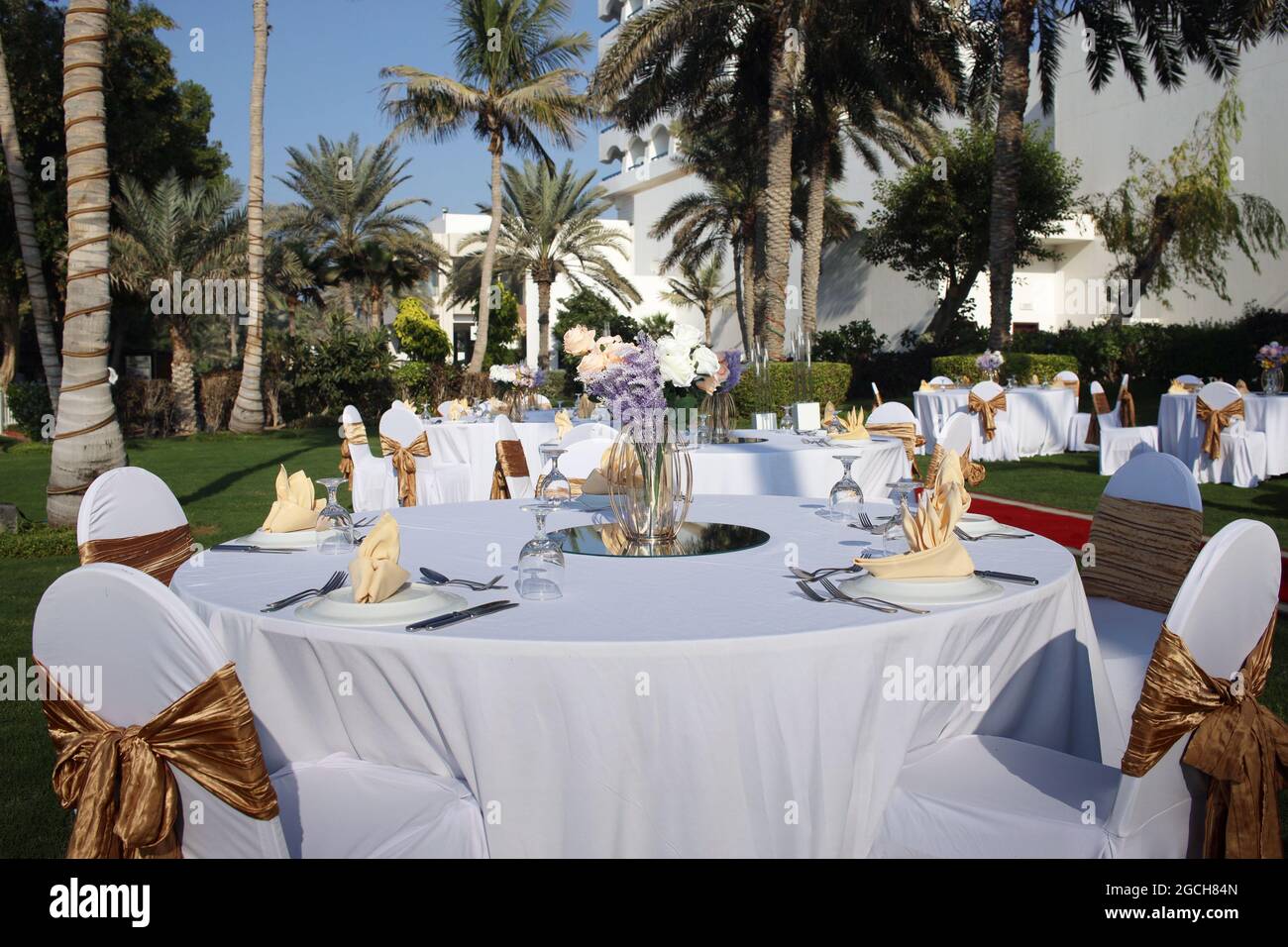 Dinner tables set in the  park Stock Photo