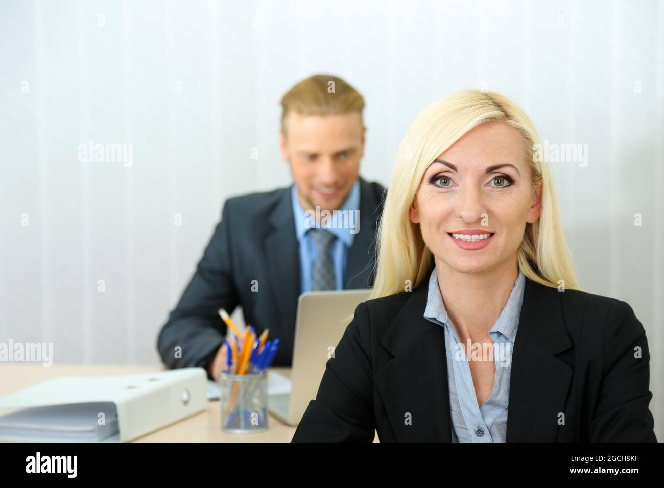 Office workers in workplace Stock Photo Alamy