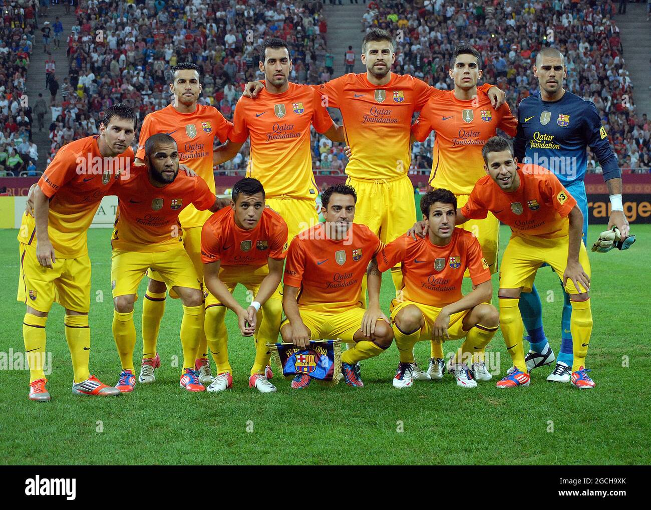 BUCHAREST, ROMANIA - AUGUST 11, 2012: Barcelona line-up poses prior to the pre-season friendly game between Dinamo Bucuresti and FC Barcelona at National Arena. Stock Photo