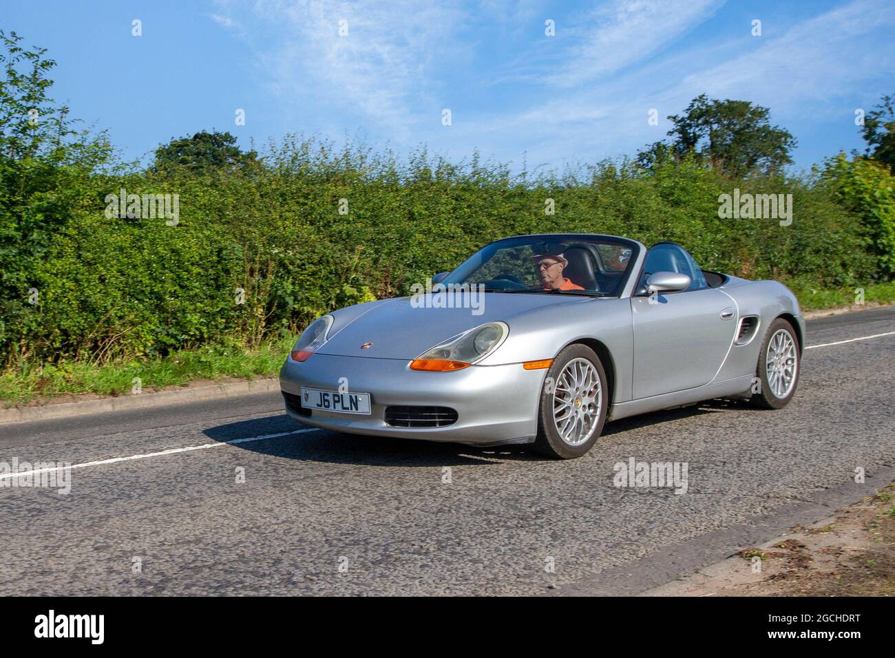2001 silver Porsche 24V 5 speed manual 2700cc petrol cabrio, en-route to Capesthorne Hall classic July car show, Cheshire, UK Stock Photo