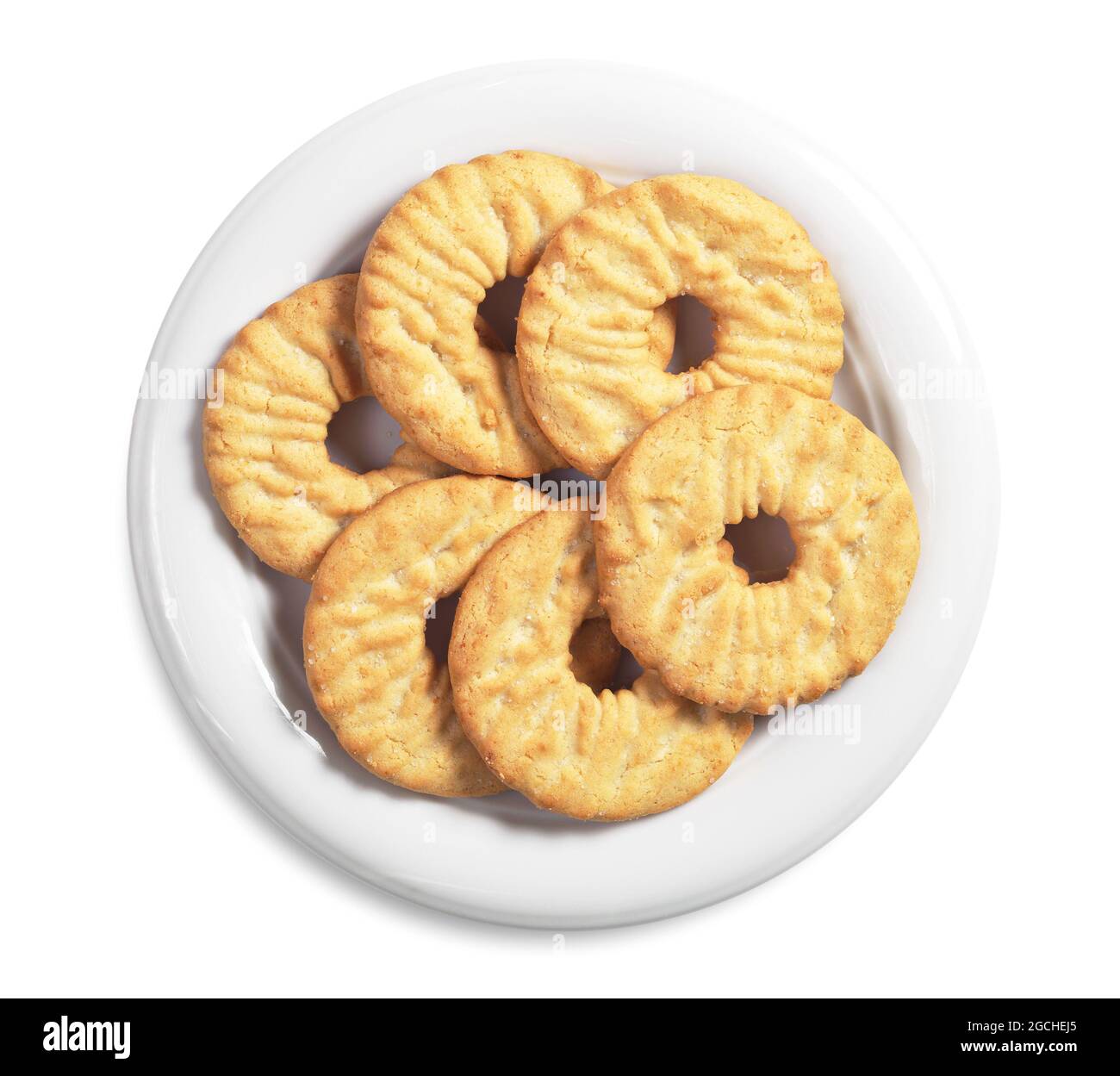 Biscuits with desiccated coconuts in plate on white background, top view Stock Photo Alamy