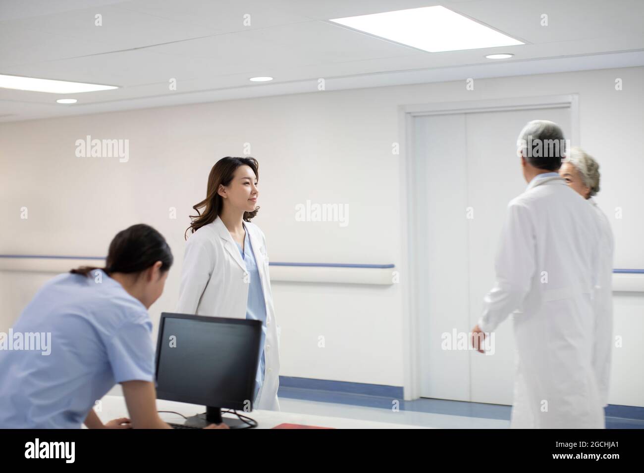 Doctors and nurses in hospital Stock Photo