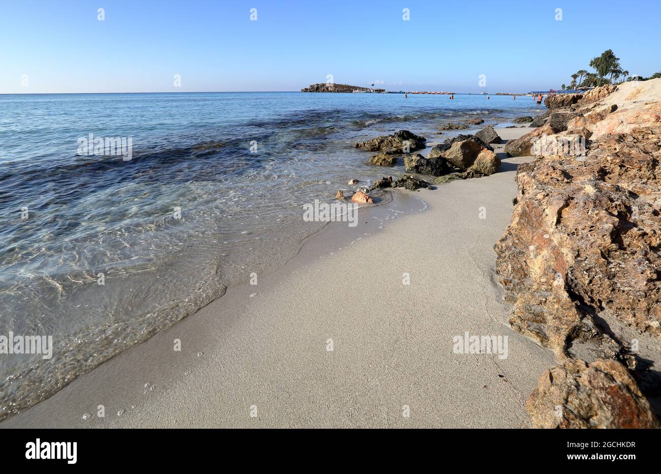 Beautiful pure Meditteranean sea bay and Nissi beach, snad and rocks, holiday vacation destination, Cyprus. Stock Photo