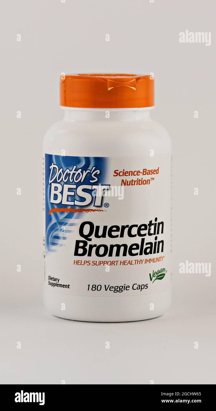 quercetin and bromelain capsules in the jar. dietary supplement