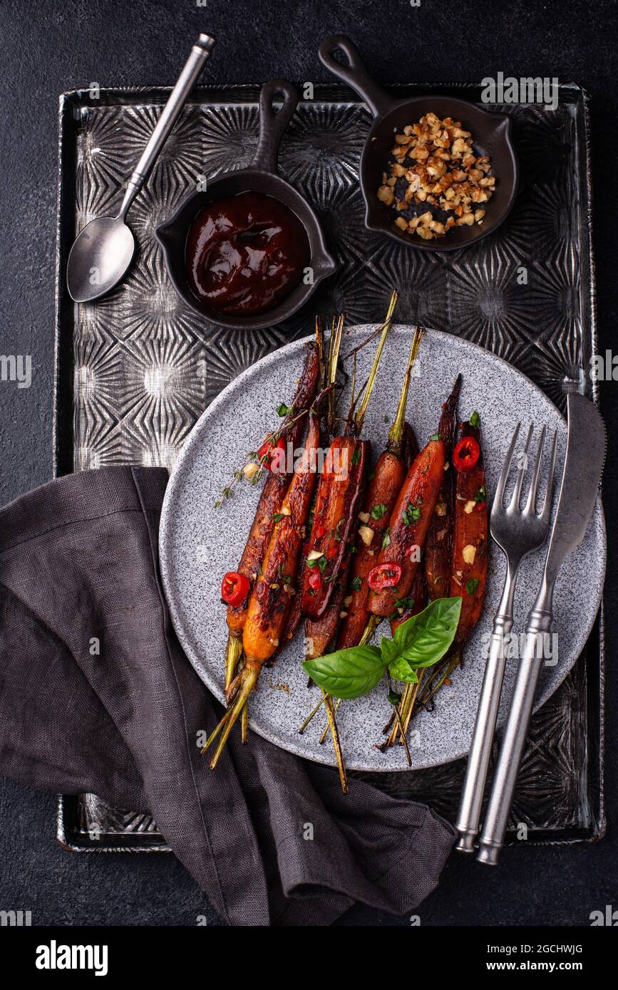 Baked carrot glazed with soy sauce and honey Stock Photo Alamy