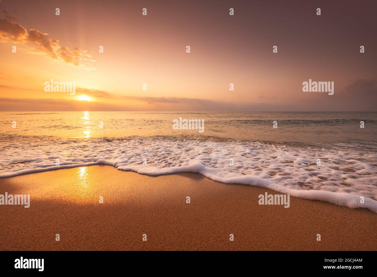 Golden sunrise over the sea Stock Photo - Alamy