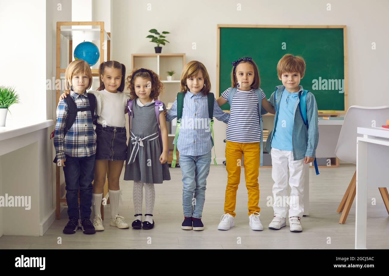 Portrait in the classroom of a small group of elementary school or kindergarten students. Stock Photo