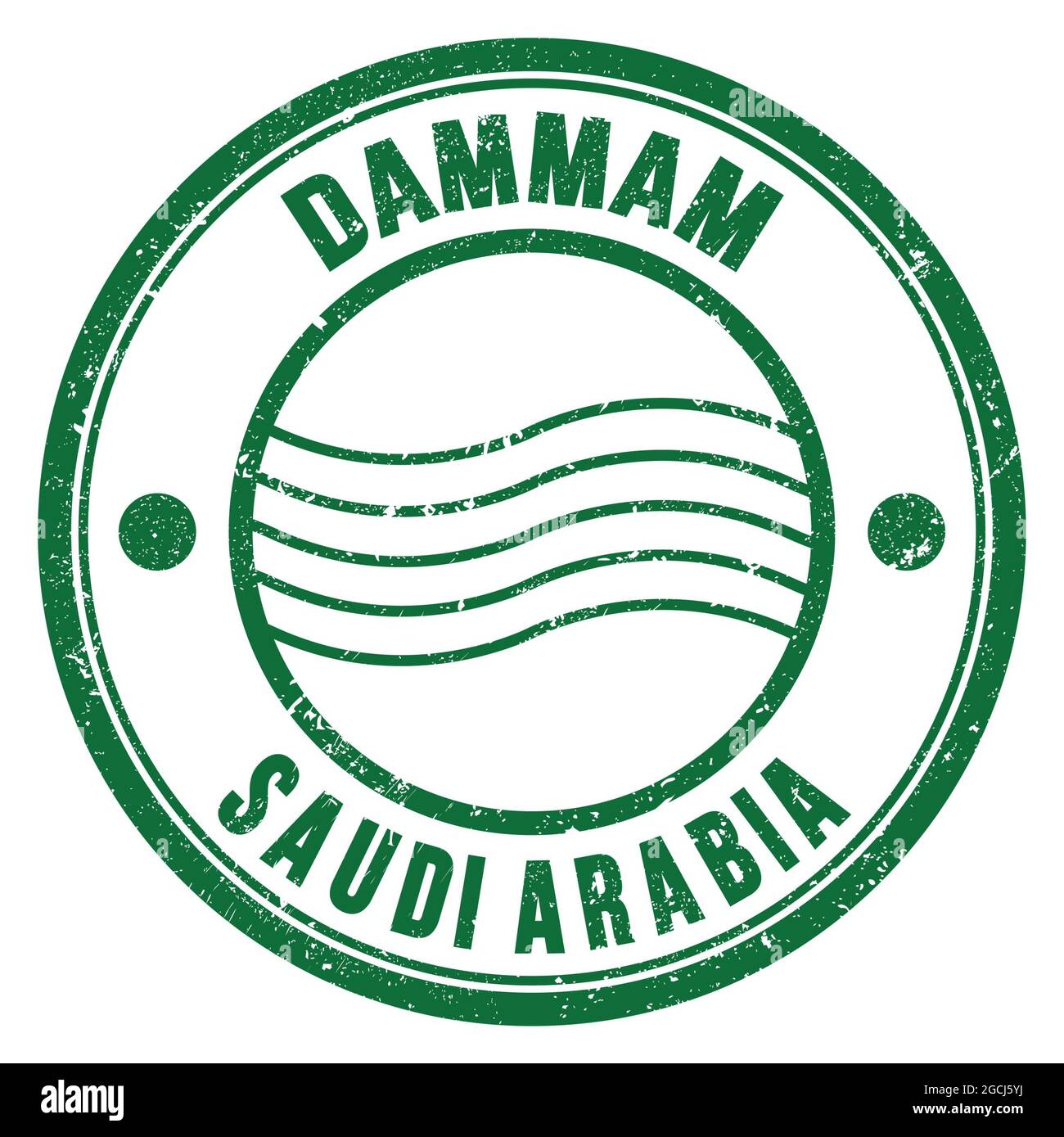 DAMMAM - SAUDI ARABIA, words written on green round postal stamp Stock Photo