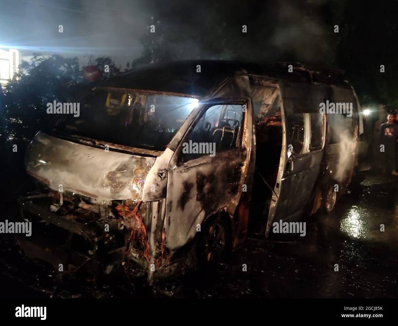 Gujranwala 8th Aug 21 Photo Taken With Mobile Phone Shows A Burnt Out Passenger Van In Gujranwala District Of Pakistan S East Punjab Province Aug 8 21 Nine People Were Killed And Three Others