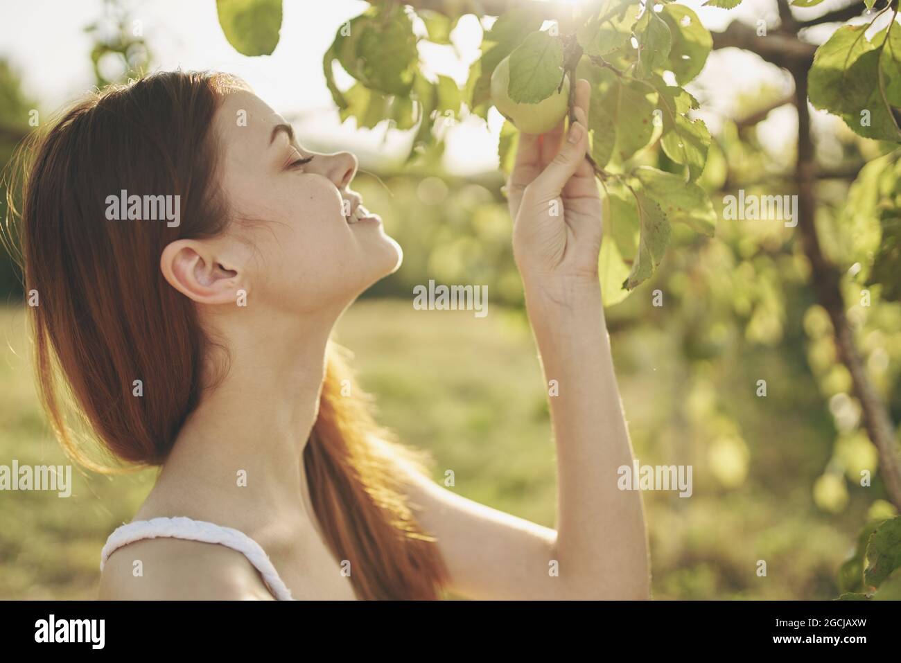 Woman in white dress nature green leaves trees fresh air Stock Photo ...
