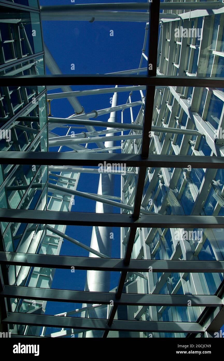 Looking upwards, through the spire, from the 77th level of the Q1 building on the Gold Coast, Queensland, Australia. Steel structure in blue sky. Stock Photo