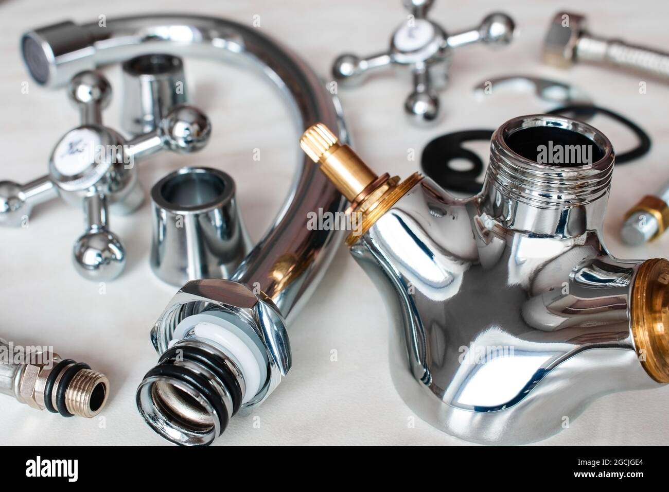 plumbing, disassembled kitchen faucet and mounting accessories Stock Photo  - Alamy