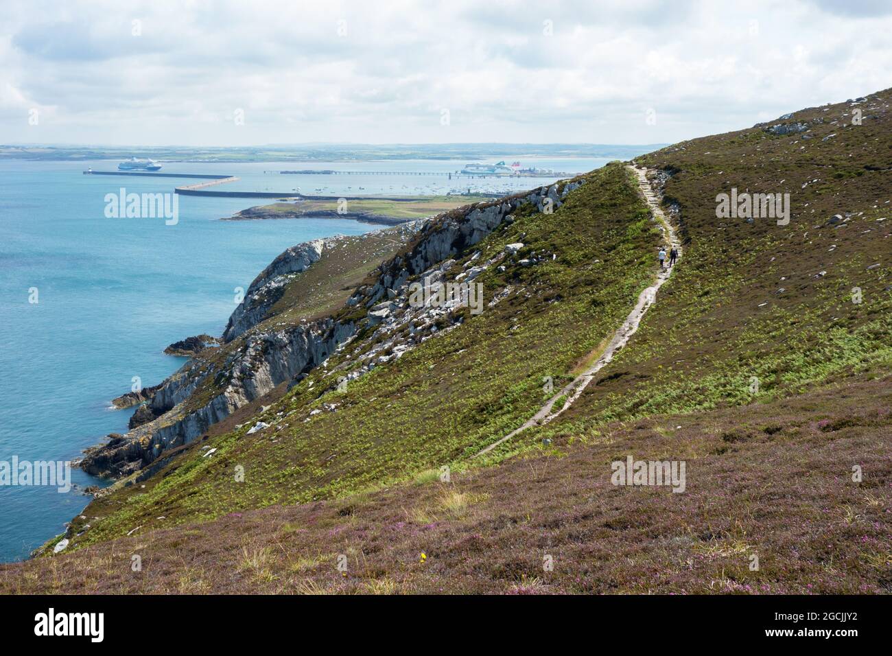 Holyhead breakwater as seen from the Anglesey Coastal Path / rocky walk Wales Stock Photo