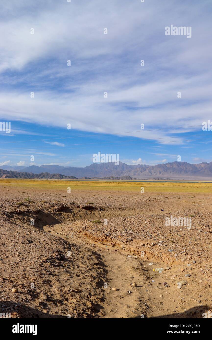 Reflection of salinealkali land in the Emerald Lake Mountains of