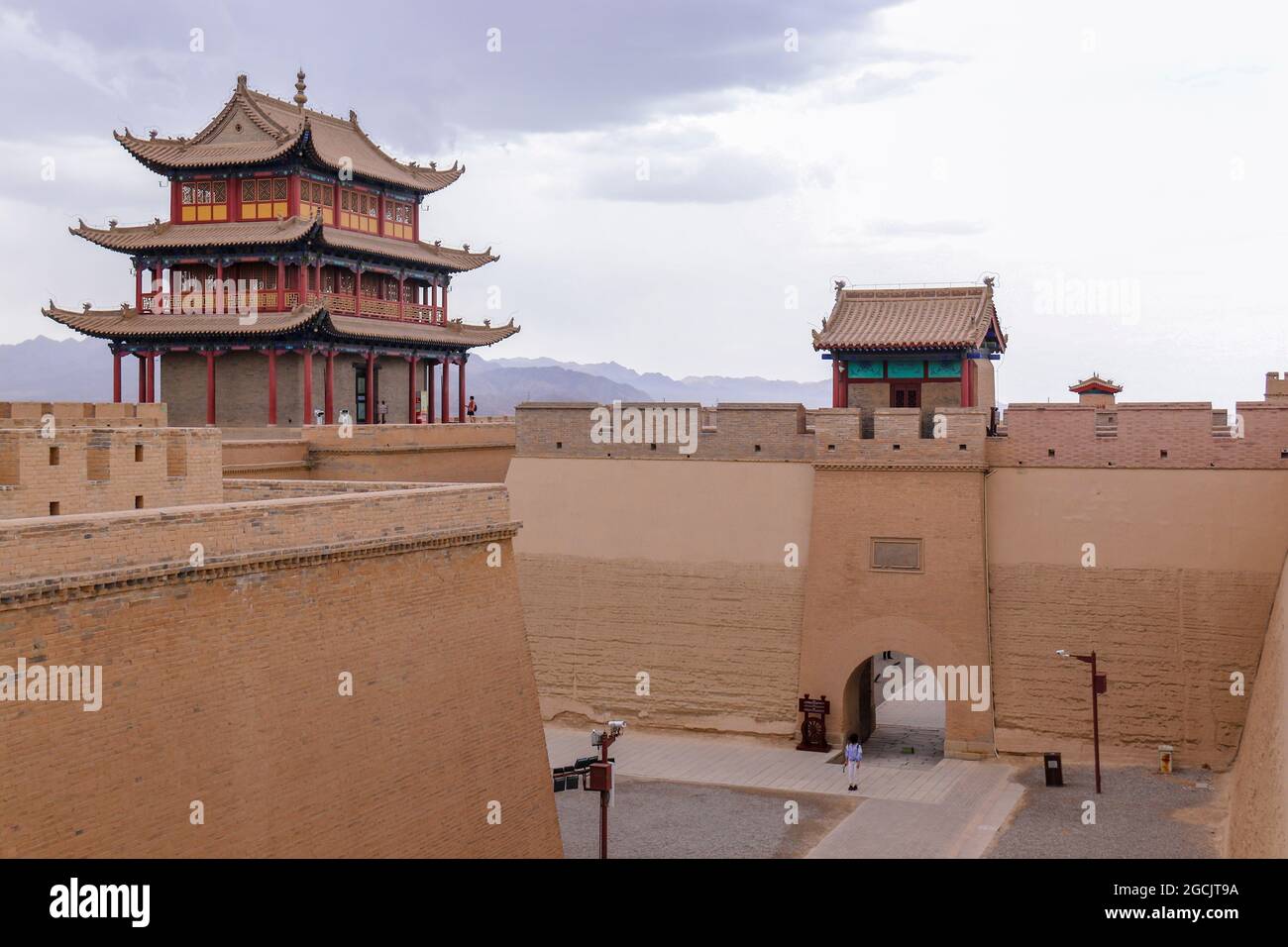 The walls and houses of the Great Wall Jiayuguan Pass in China have remained majestic for more than 2,000 years in Jiayuguan City, Gansu Province, Chi Stock Photo