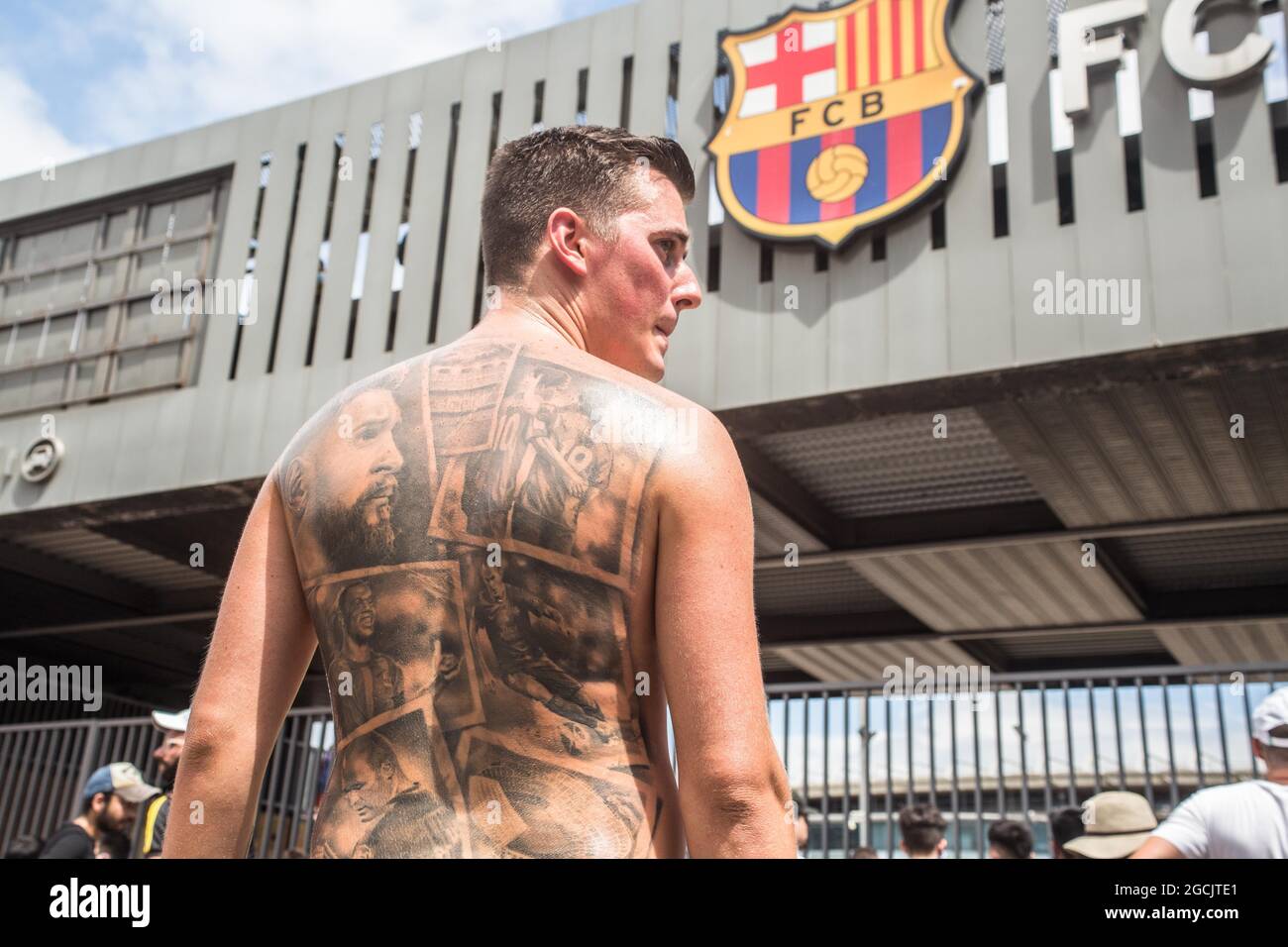 Barcelona Catalonia Spain 8th Aug 2021 Lionel Messi fan with a tattoo  on his back with the face of Messi and other idols of FC Barcelona such as  Ronaldinho Ronaldo de Assis