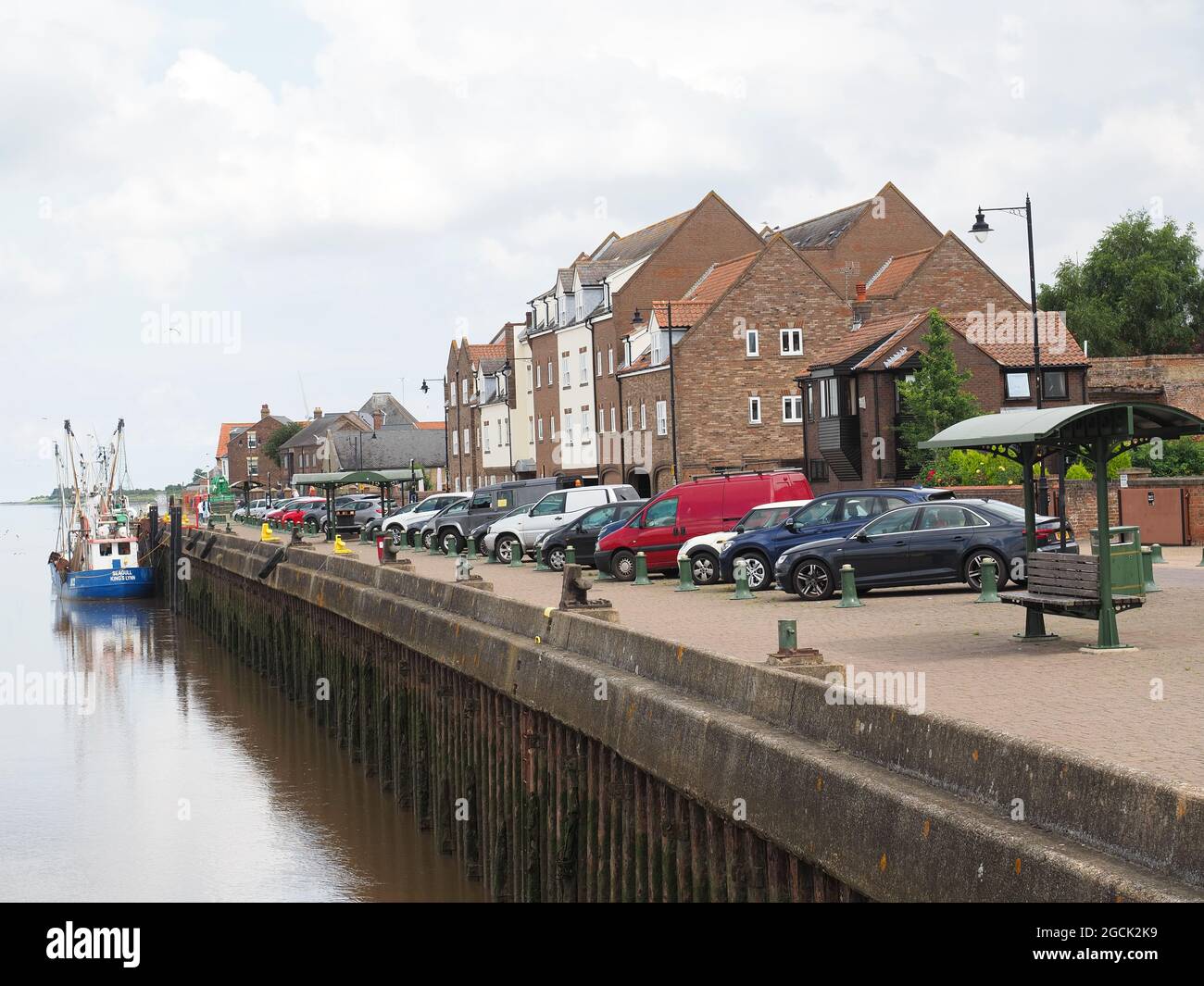 View looking along South Quay alongside the River Great Ouse in the old historic area of King's Lynn in Norfolk UK Stock Photo