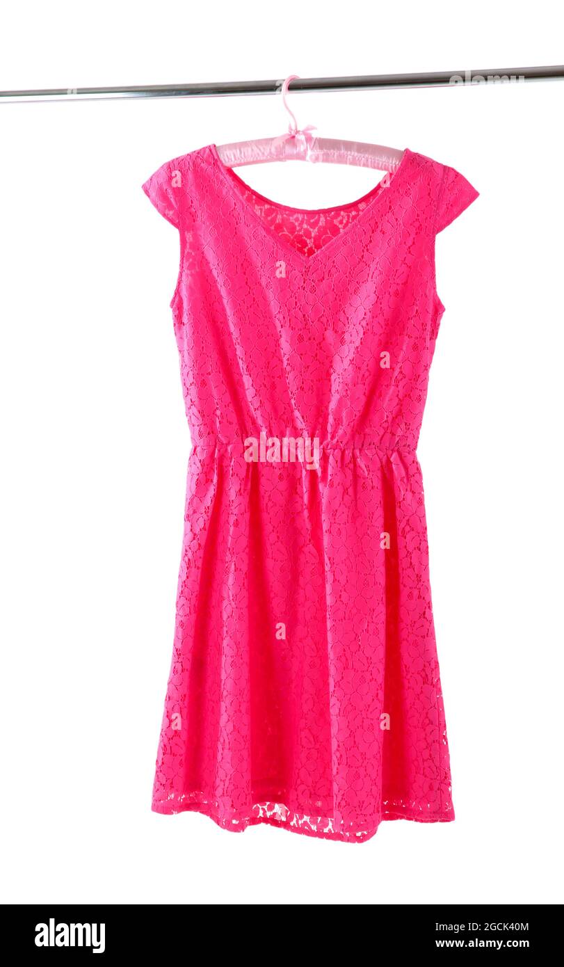 Beautiful pink dress hanging on hangers isolated on white Stock Photo
