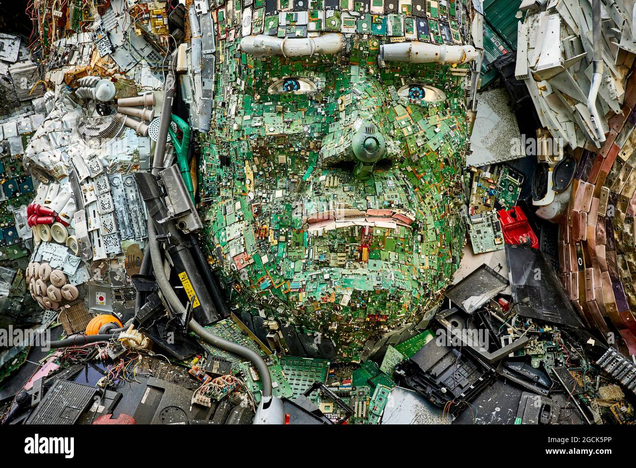 Stockport MusicMagpie giant Mount Rushmore style sculpture G7 leaders head's made entirely of discarded electronics Angela Merkel Joe Biden Stock Photo