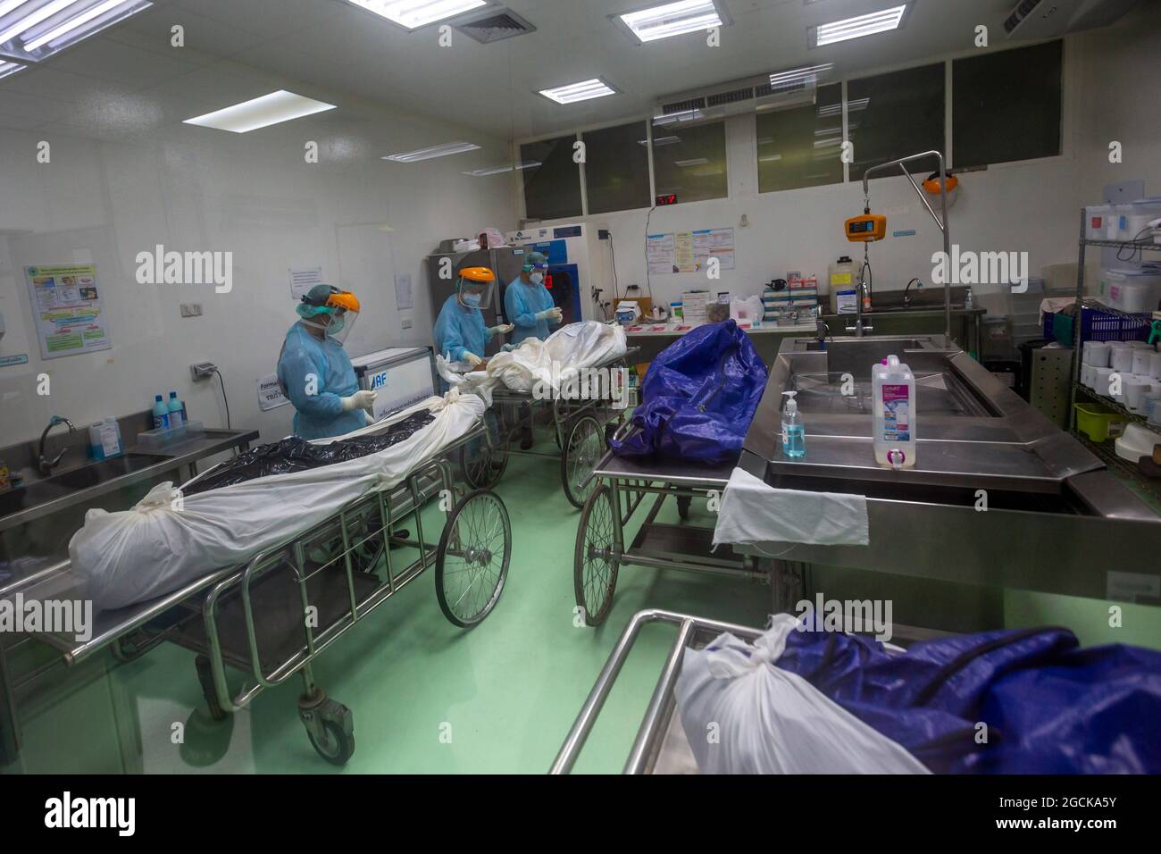 Khlong Luang Pathum Thani Thailand 9th Aug 21 A Doctor At The Thammasart University Rangsit Campus Hospital S Department Of Forensice Science Performs A Covid 19 Nasal Swab Test On Corpse Credit