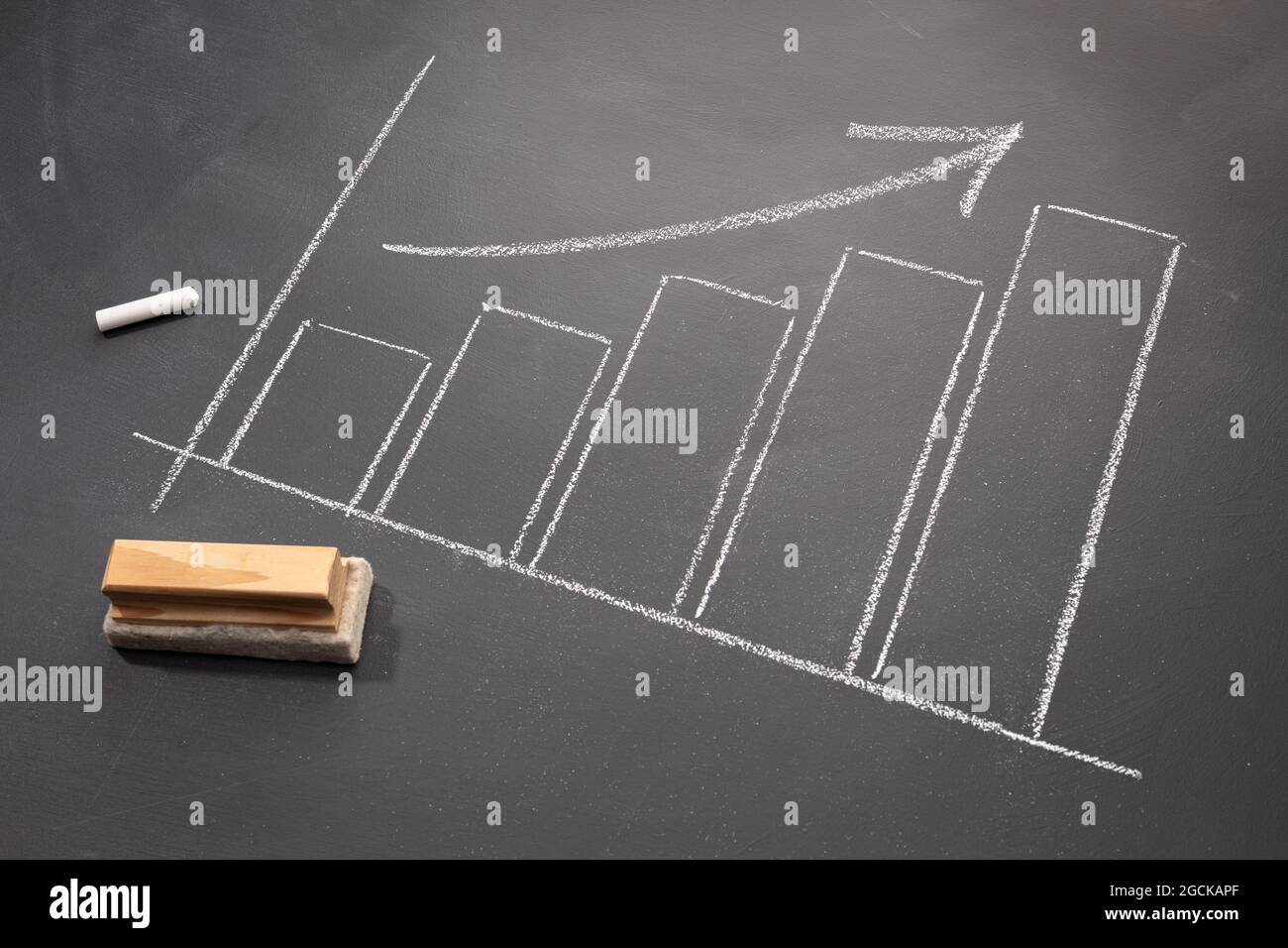 Hand drawn growing Business bar chart on blackboard. Business growth concept Stock Photo