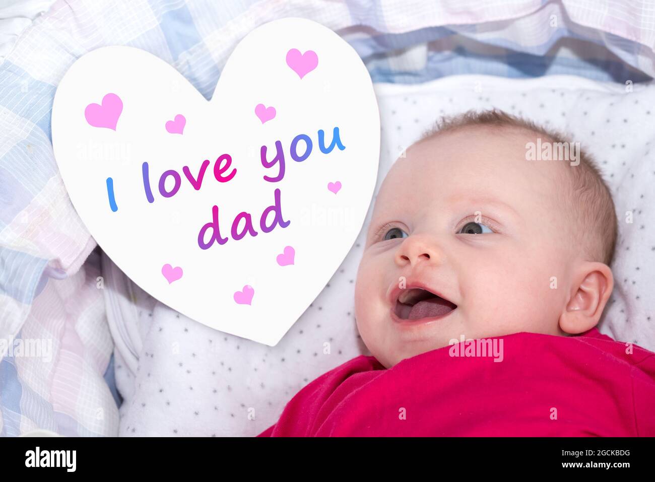 Smiling Baby Girl With A Message Of Love For Her Dad Stock Photo Alamy