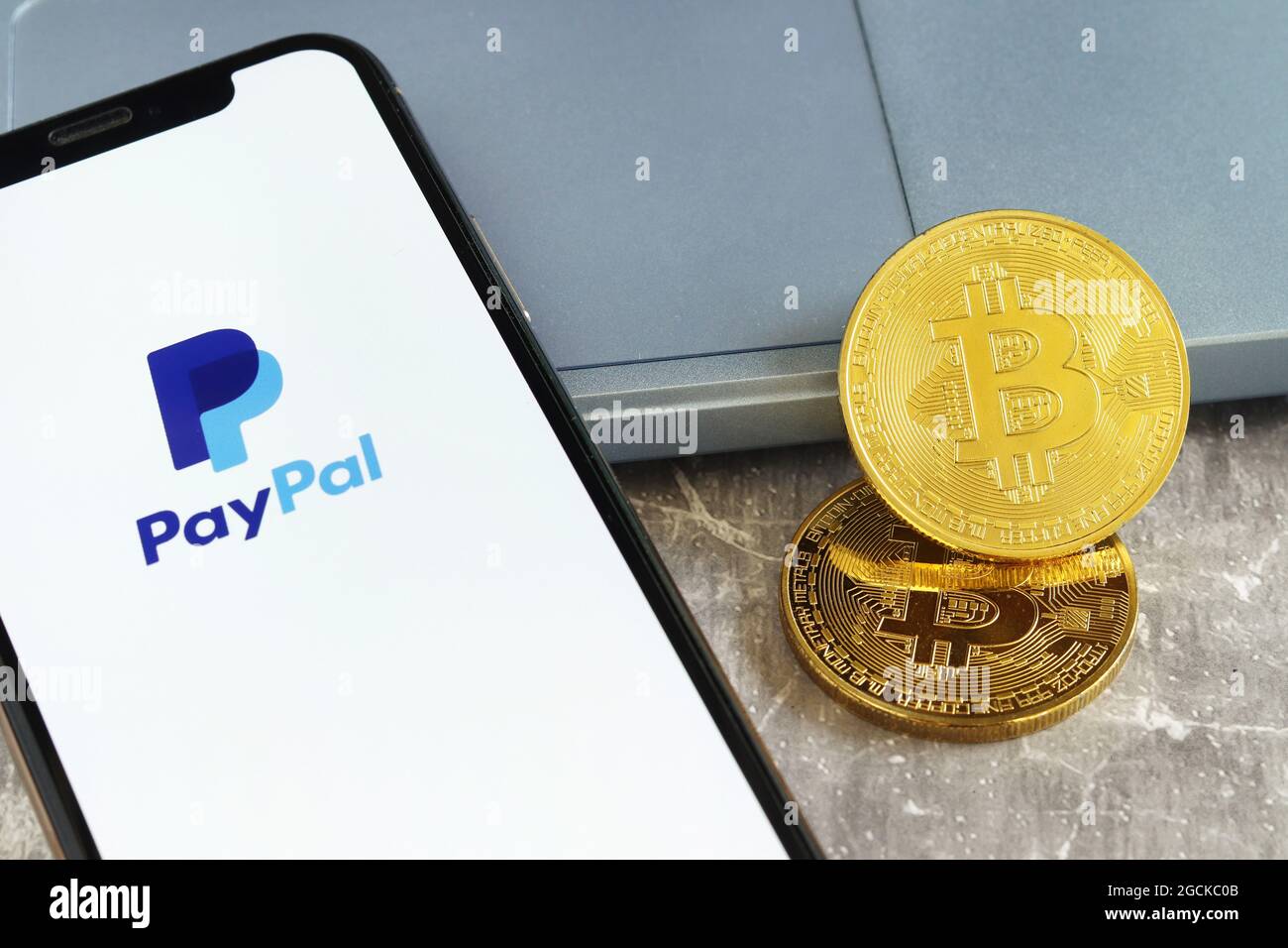 8 August 2021 Chiang mai, Thailand : PayPal logo on the screen smartphone  with bitcoin Cryptocurrency Coins, Paypal is an internet based digital  money Stock Photo - Alamy