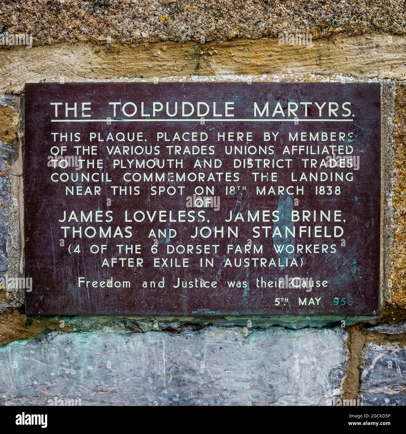 Plaque noting return from exile in Australia of 4 Dorset farm workers - Tolpuddle Martyrs Stock Photo