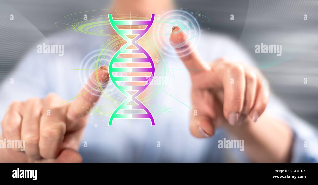 Woman touching a transhumanism concept on a touch screen with her fingers Stock Photo